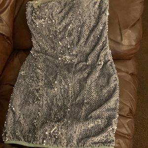 A charcoal and light gray sequin dress